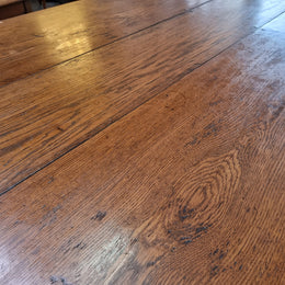 Amazing 19th Century French Oak Farmhouse Style Dining Table with three drawers. It is made from 3 large planks of wood which is very hard to find. 105.5 cm wide.