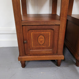 Pair of Antique French Oak Louis XVI style marble top bedside cabinets. They have decorative inlay and have been sourced from France. They are in good original detailed condition.
