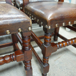 Here we have a fabulous set of six French oak rustic leather dining chairs with two carvers. Chairs are upholstered in brown leather and are very comfortable and solid. Is in very good original condition.