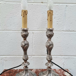 Pair of Antique French silver candlesticks table lamps embossed with birds and floral pattern. In good original detailed working condition.