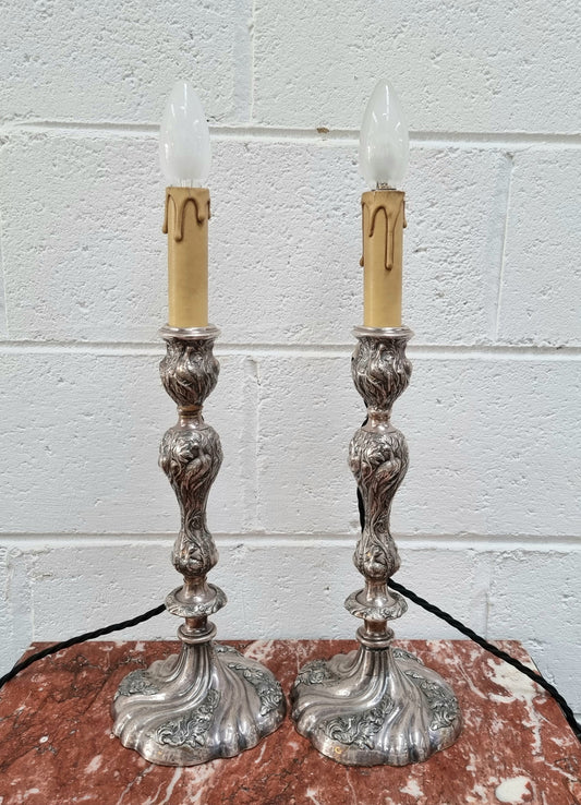 Pair of Antique French silver candlesticks table lamps embossed with birds and floral pattern. In good original detailed working condition.