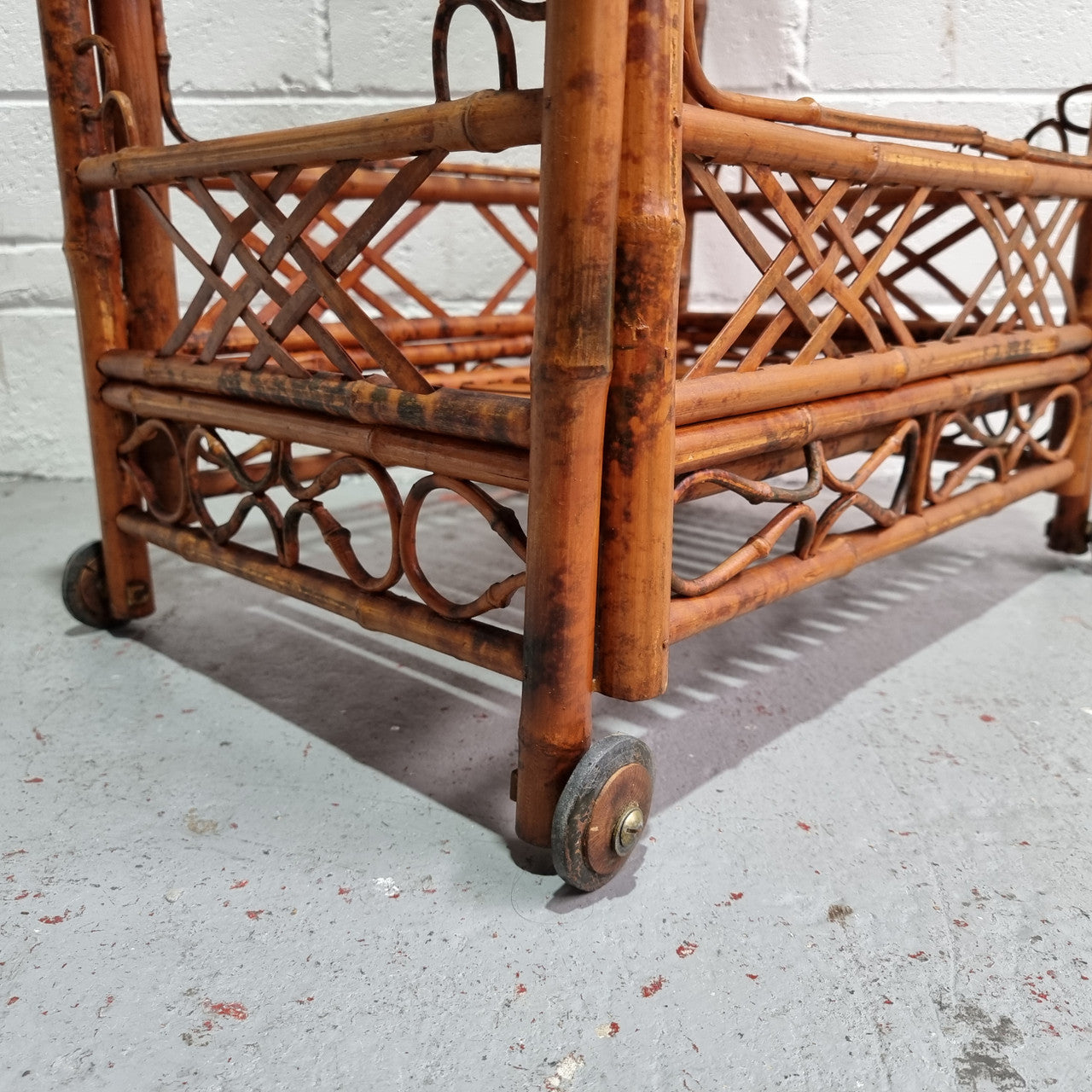 Excellent Vintage Tortoiseshell Bamboo two tier auto trolley. It has been sourced locally and is in fantastic original detailed condition .