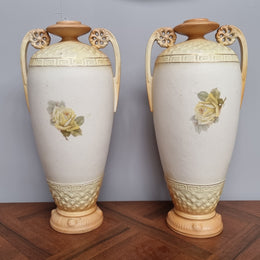 Lovely pair of Edwardian floral vases from Austria with beautiful roses on them in good original condition. Some crazing throughout please view photos as they help form past of the description.