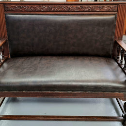 Superbly carved early 19th century newly upholstered French Oak hall seat of grand proportions and lovely details in good condition.