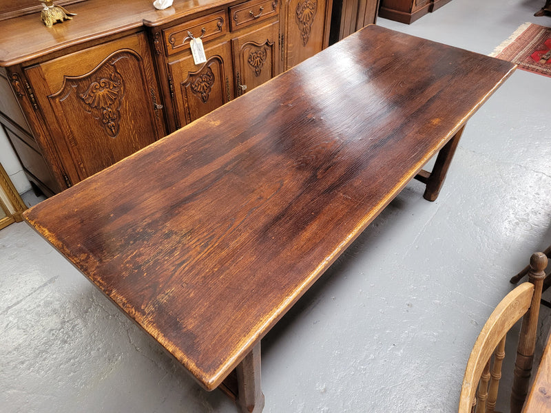 French oak stretcher base refectory table. It has been sourced from France and is in good original condition. Please see pictures to form part of the description.