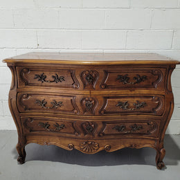 Impressive French Louis 15th style three drawer Commode featuring inlaid parquetry top and carving on drawers.