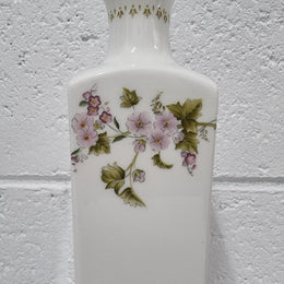 Lovely floral Wedgwood white vase with a pretty design in good condition, please view photos as they help form part of the description.