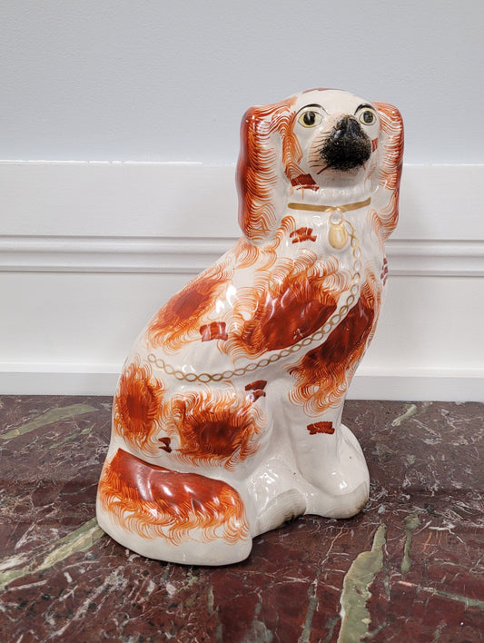 Antique Staffordshire dog statue. Please view photos as they help form part of the description.
