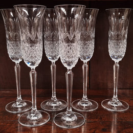Set of eight crystal champagne glasses. In good original condition.