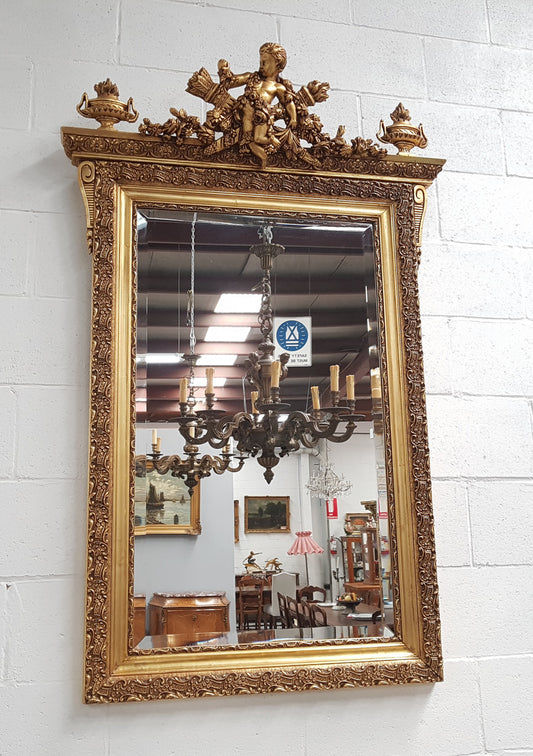 A stunning French 19th century gilded wall mirror in good original condition.