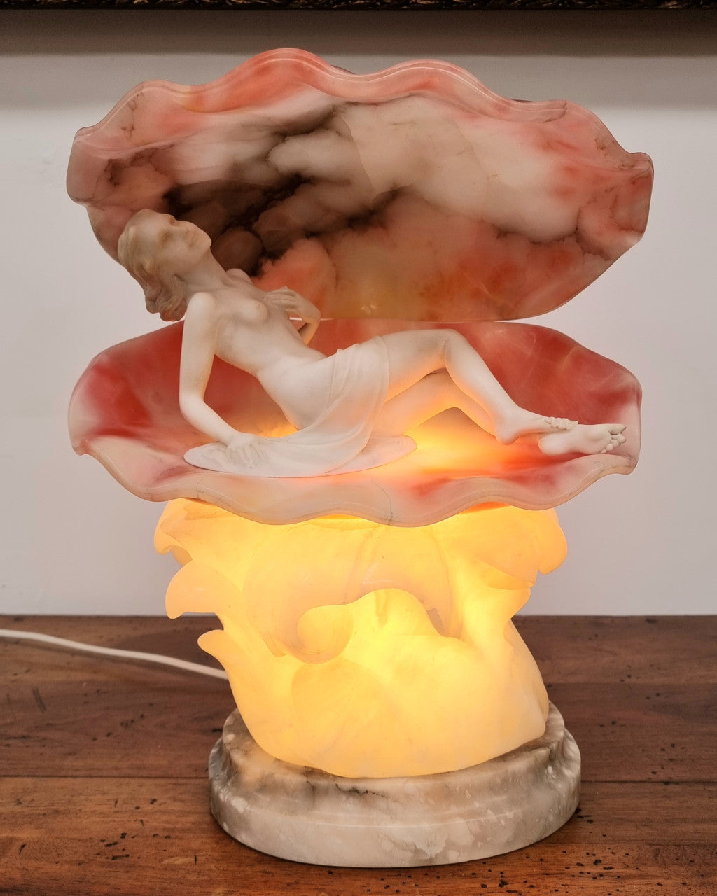 A superb original hand carved Art Deco lamp. Alabaster and marble sculpture of a nude woman inside a clam shell. Italian, inscription to base. Circa 1920's. Subtle colouring to clam shell for a sunset effect. This is a world class example of a true Art Deco sculpture lamp. It is in good original detailed condition, please view photos as they help form part of the description.
