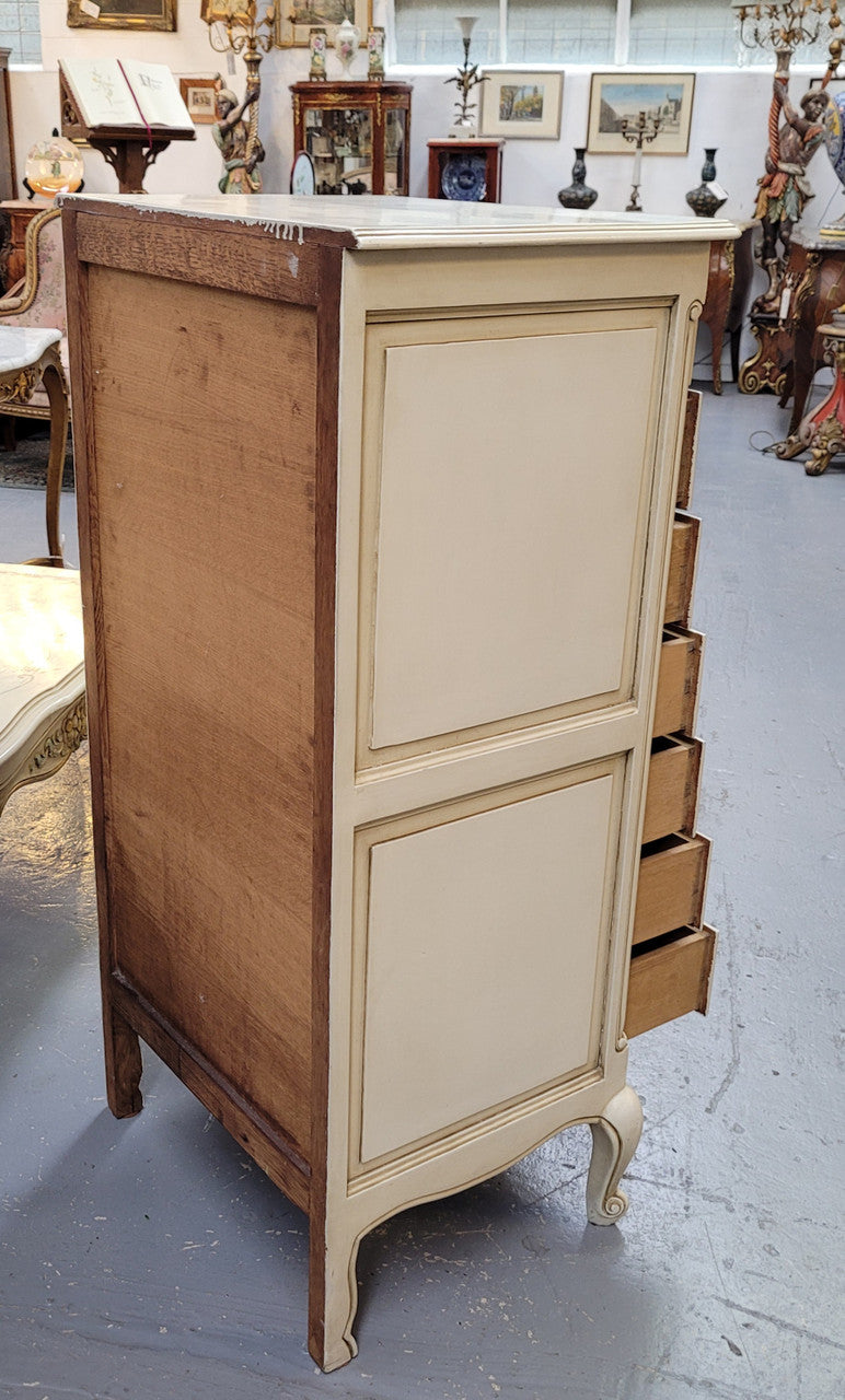 Vintage French Louis 15th Style original painted seven drawer semainier of pleasing narrow proportions with panelled sides. They have been sourced from France and are in good original condition.