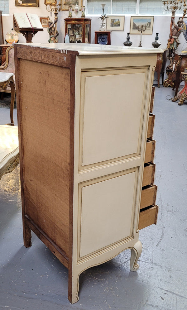 Vintage French Louis 15th Style original painted seven drawer semainier of pleasing narrow proportions with panelled sides. They have been sourced from France and are in good original condition.