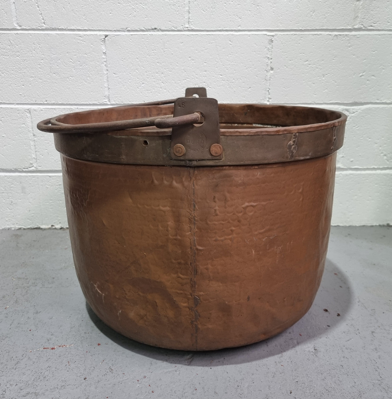 Large Antique French copper cauldron with metal band around rim. It is in good original condition.