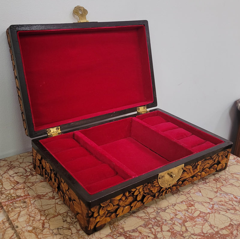 Vintage unusual Camphor Wood valet fitted jewelry box with nicely carved phoenix on the top. It is in good original detailed condition.