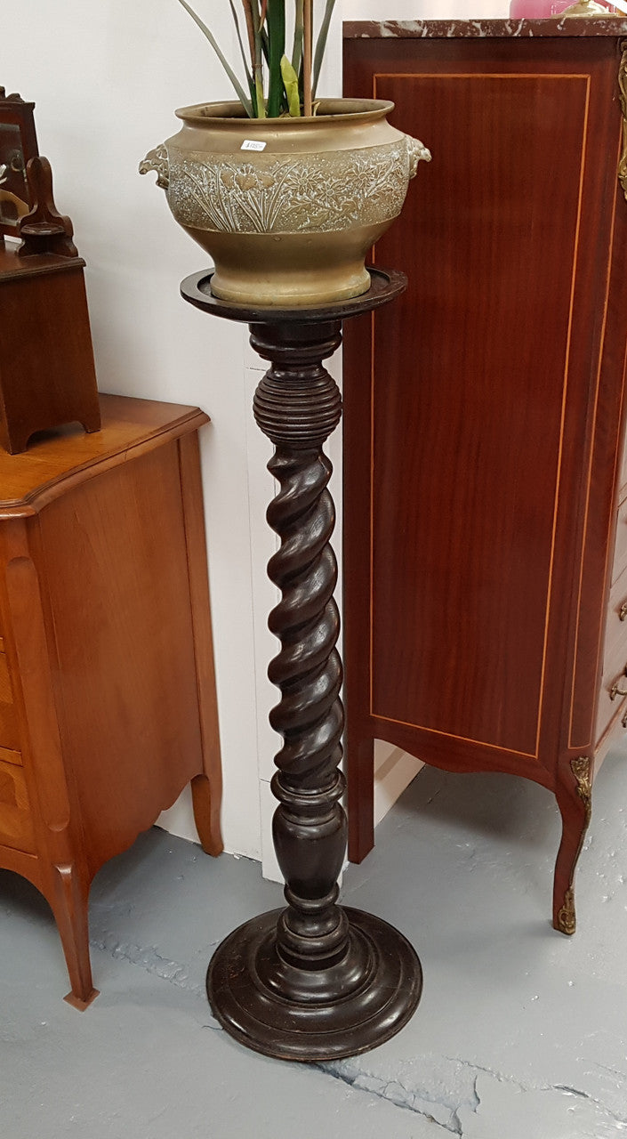 A Victorian round walnut barley twist pedestal/planter and in good original condition.