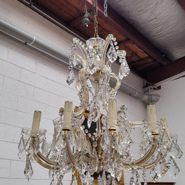 Impressive elegant ten arm French crystal chandelier that has been sourced from France. It has been fully rewired to Australian standards and is in good original working condition.