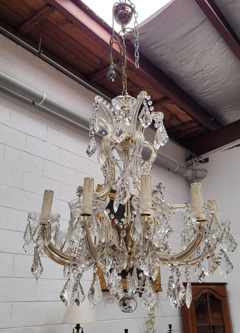 Impressive elegant ten arm French crystal chandelier that has been sourced from France. It has been fully rewired to Australian standards and is in good original working condition.