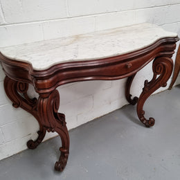 19th Century French Mahogany marble top console table. Louis XV style with white marble top and single drawer. Sourced from France and in good original detailed condition.