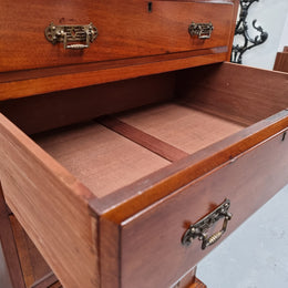 Lovely Antique English walnut tallboy/ chest of drawers. There are five drawers which all differ in sizes and have lovely hardware. It is in good original detailed condition.
