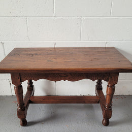Small French Oak rustic coffee table. Perfect size for a small area and it is in good original detailed condition.