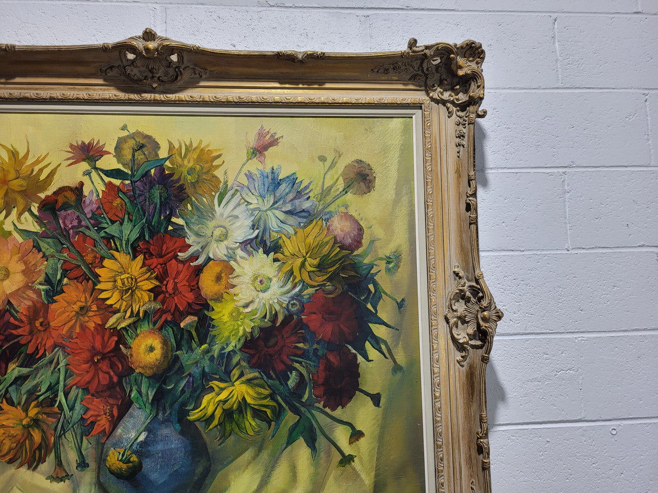 Large vibrant French oil on canvas of flowers and signed “Y.Fonteyn". In an amazing gilt frame and is in good original condition.