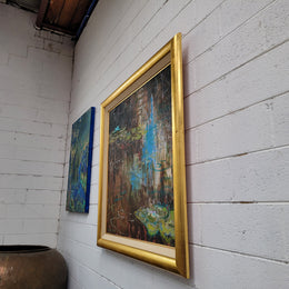 A beautiful Framed oil on canvas in vibrant colours and framed in a lovely gold frame. This piece is signed by artist John Cumming from "The Mill Gallery" and still has its original gallery card as shown in picture. It is in good original condition.
