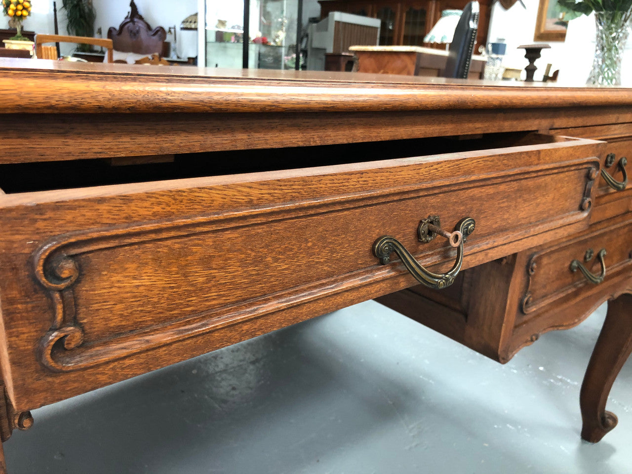 French Oak Louis XV style full partners desk with both sides having five functional drawers. In very good original detailed condition.