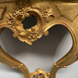 Rare Pair Of Antique carved gilt wood & marble top console tables. They are "wall mounted".