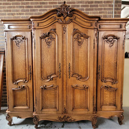 Amazing French Oak Louis XV style four door armoire. Plenty of storage space and beautifully carved throughout. In good original detailed condition and sourced from France. Please contact us for further photos.