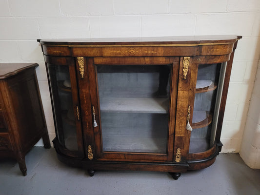 Victorian Rosewood inlaid side cabinet/credenza with velvet lined shelves and gilt mounts. It has been sourced locally and is in good original condition with loads of character.