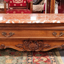 Amazing original walnut Louis XV style coffee table with a marble top, one drawer on either end and a faux drawer at the front. In good original detailed condition, sourced in France.