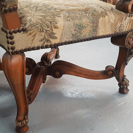 A sensational French walnut carved chair