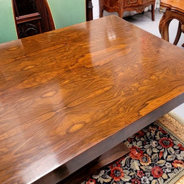 French Art Deco Figured Walnut dining table and six chairs. This stylish table also comes with a glass top and can be used with or without it. The chairs are very comfortable and the table can also fit another two chairs at either end making it a 6-8 seater. The table is in good original detailed condition with character marks to the top of table as shown in the pictures. This table and six chairs have been sourced locally.