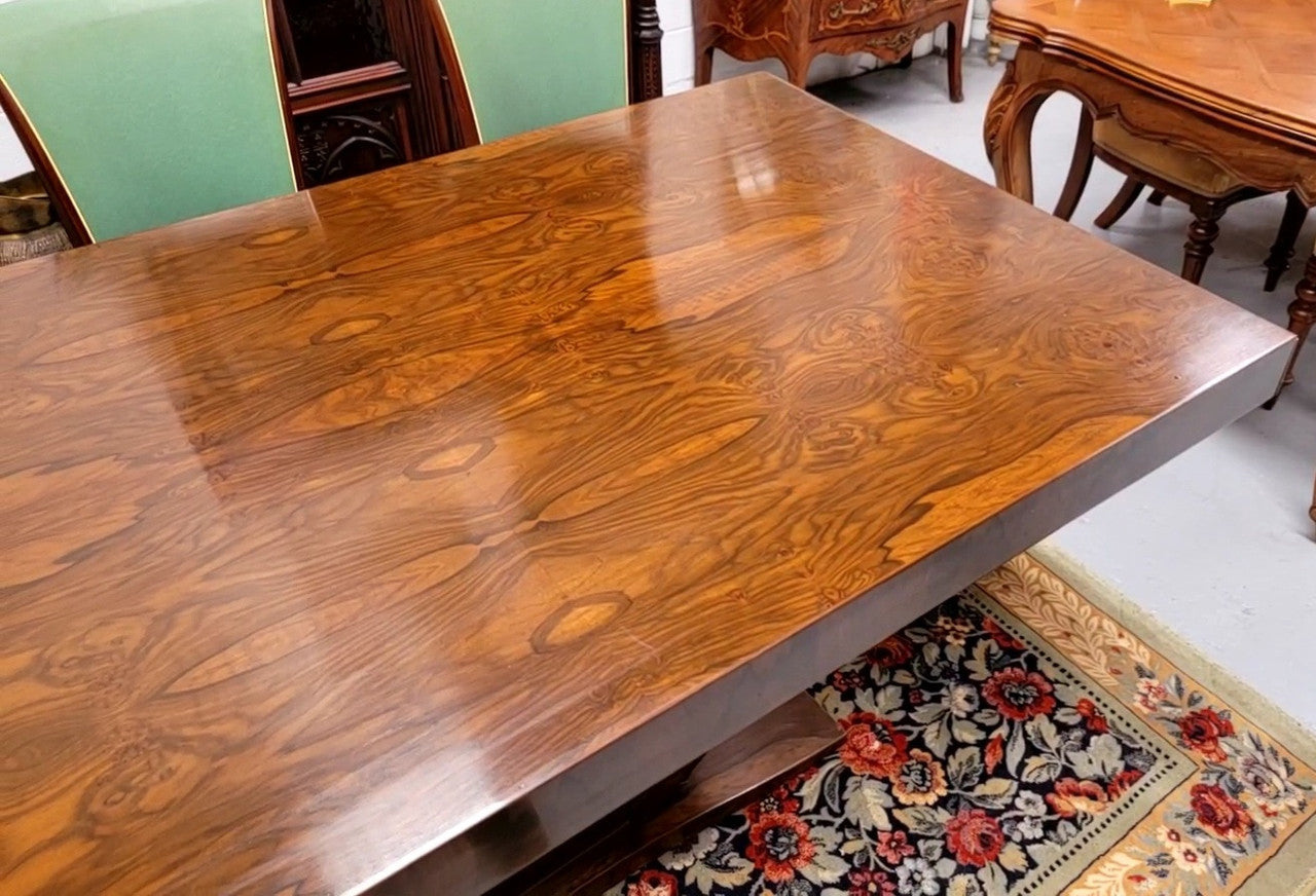 French Art Deco Figured Walnut dining table and six chairs. This stylish table also comes with a glass top and can be used with or without it. The chairs are very comfortable and the table can also fit another two chairs at either end making it a 6-8 seater. The table is in good original detailed condition with character marks to the top of table as shown in the pictures. This table and six chairs have been sourced locally.
