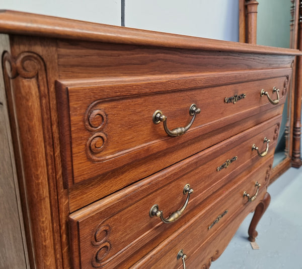 French Provincial Oak chest of three drawers. In good original detailed condition.