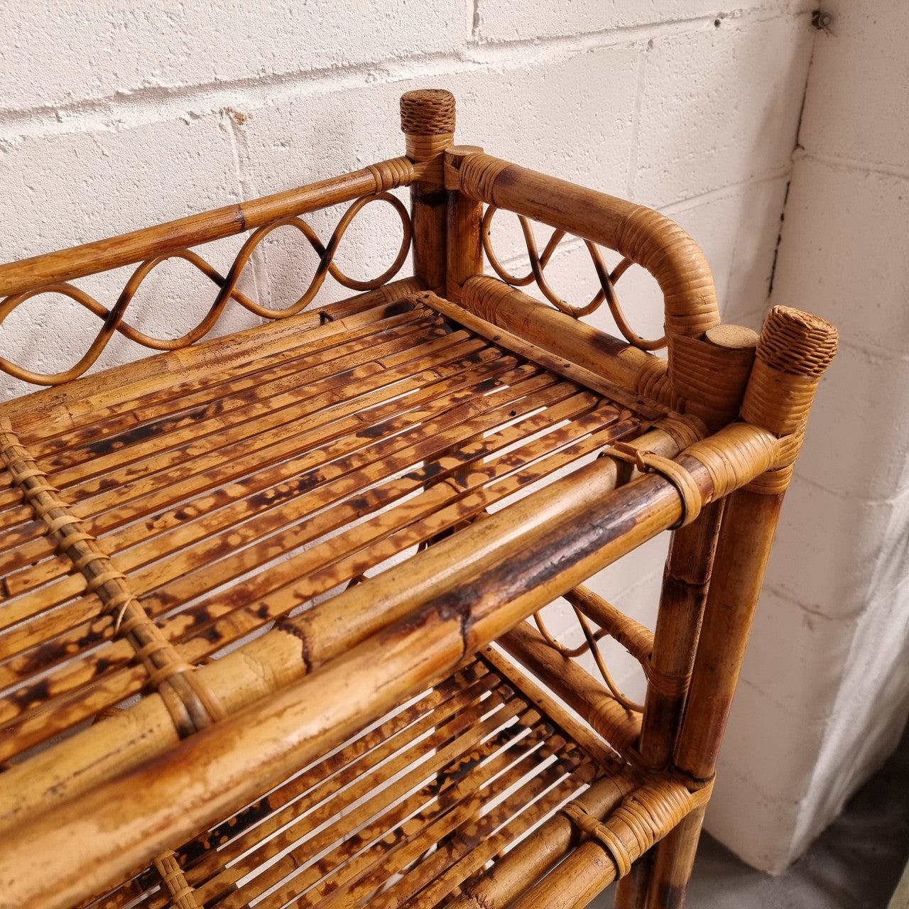 Vintage Tortoiseshell Bamboo Shelves.  Good size unit with irregular shelves. It is in good original condition and it very solid.
