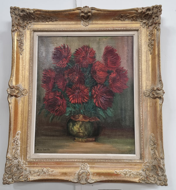 Charming oil on canvas of red Chrysanthemums painting. Sourced in France and signed in a lovely ornate gilt frame. In good original detailed condition.