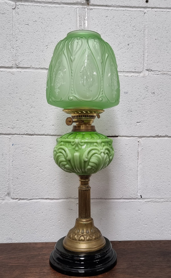 Beautiful Victorian green banquet lamp. It is in good condition, shade looks to be a later. It has been sourced locally.