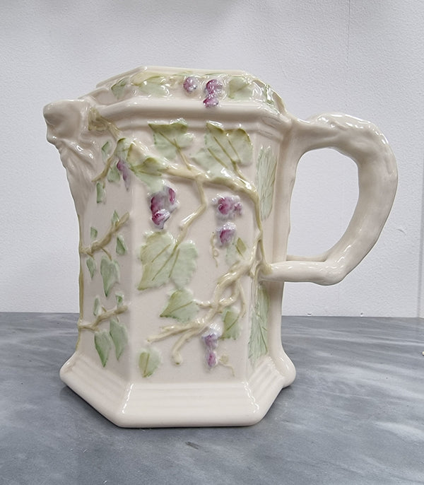 Belleek brown stamp (1980 – 1993) jug with ivy decoration, branch handle and Bacchus spout. It is in good original condition, please view photos as they help form part of the description.