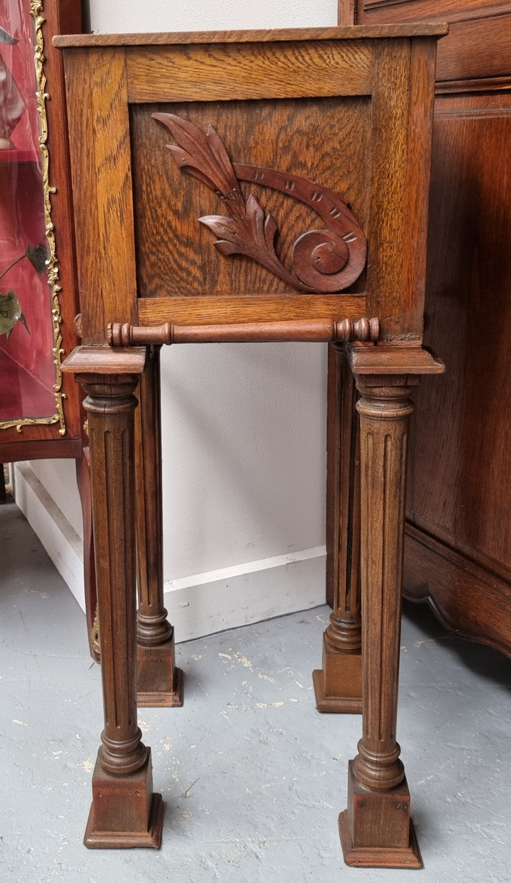 Wooden Arts and Crafts pedestal planter stand with decorative carvings. Sourced locally and is in good original condition.