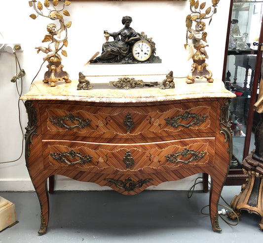 A stunning French 19th century Louis XV style commode with kingwood marquetry inlay. Has beautiful ormolu mounts and marble top.