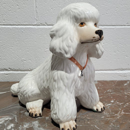 Vintage Italian ceramic Poodle figurine. It is beautifully detailed and in good original condition with no chips or cracks does have crazing to glaze.