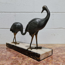Fabulous French Art Deco cold painted spelter Ibis birds on a stylized Art Deco marble base. Signed "Rochard" circa 1930's. In good original detailed condition.