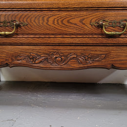 French Louis XV style Oak three drawer chest with wooden top. It has been sourced from France and is in good original detailed condition.