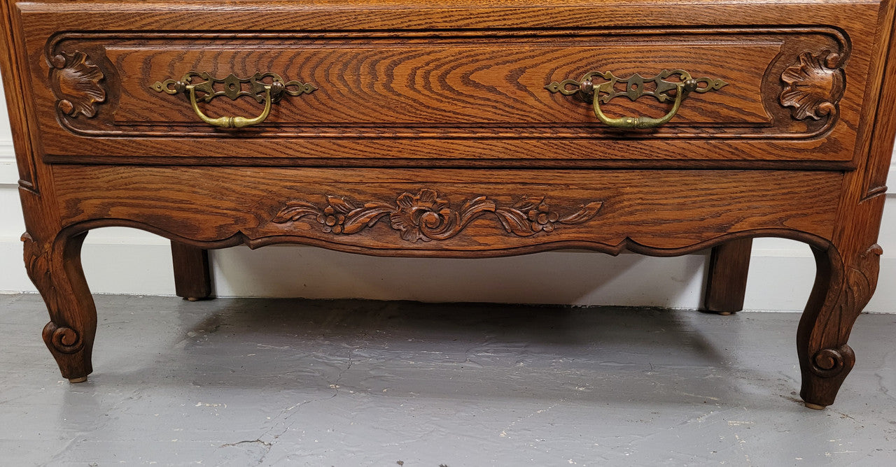 French Louis XV style Oak three drawer chest with wooden top. It has been sourced from France and is in good original detailed condition.