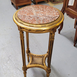 Late 19th Century French Louis XVI style round marble top side table/ lamp table. It is in good original detailed condition and has been sourced from France.