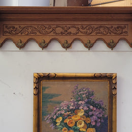French Oak hanging wall rack with seven hooks. It has been sourced from France and is in good original detailed condition.