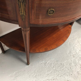 French marble top half round console table. It has beautiful marquetry inlay and ormolu mounts with a single drawer. In good original condition.