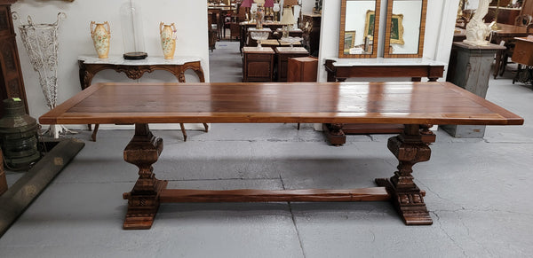 French style reclaimed Elm Farmhouse table with stretcher base and amazing carving underneath. Table can sit 10-12 people and is in good original detailed condition.